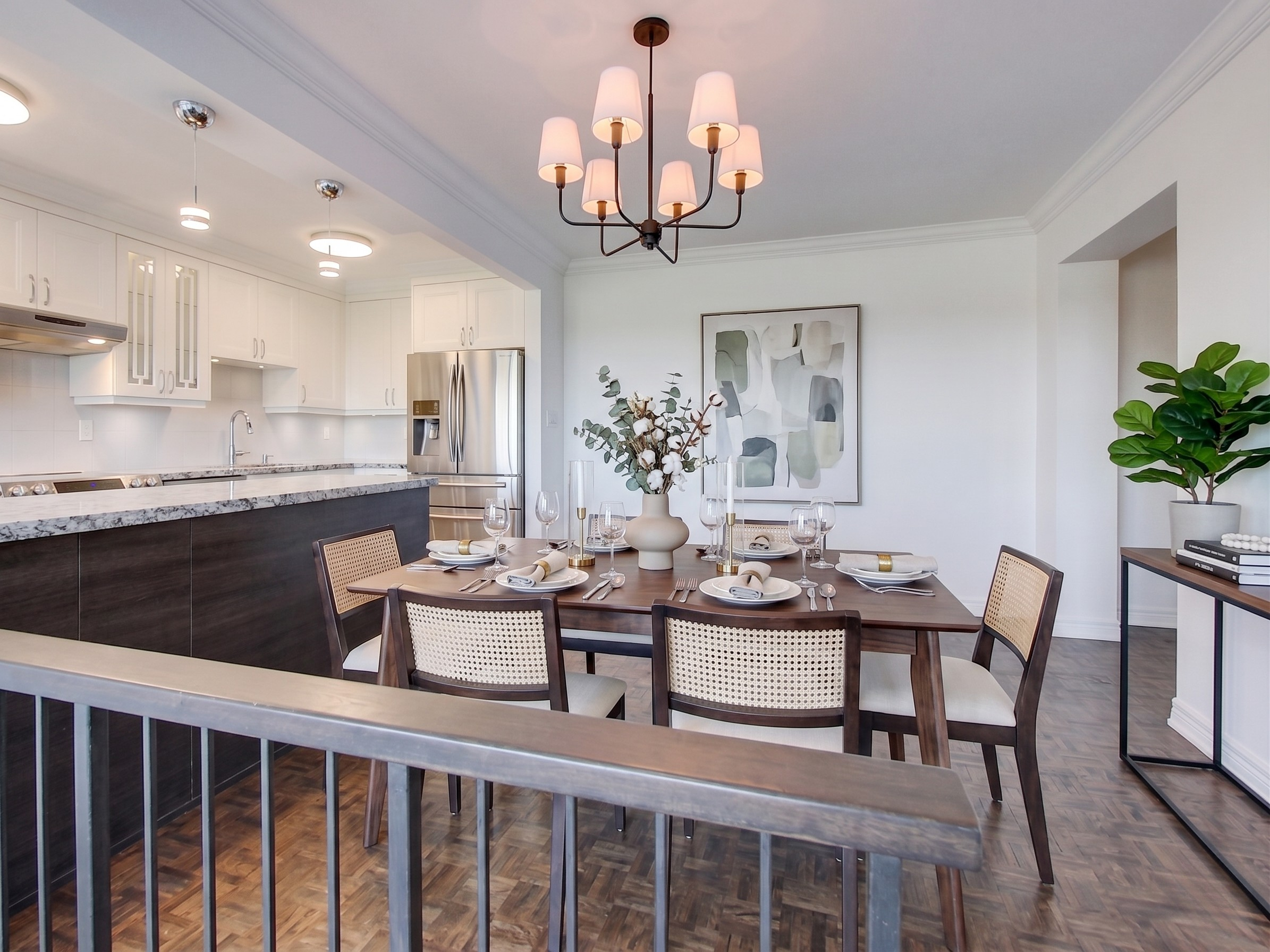 Staged dining area & chef's kitchen